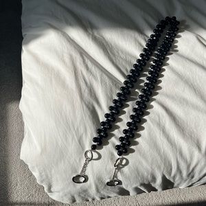 Beaded shoulder strap